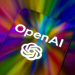 The OpenAI logo is displayed on a mobile phone screen in this photo illustration, as artificial intelligence tools continue to expand across consumer and business applications in Brussels, Belgium, on February 28, 2026. (Photo by Jonathan Raa/NurPhoto)
